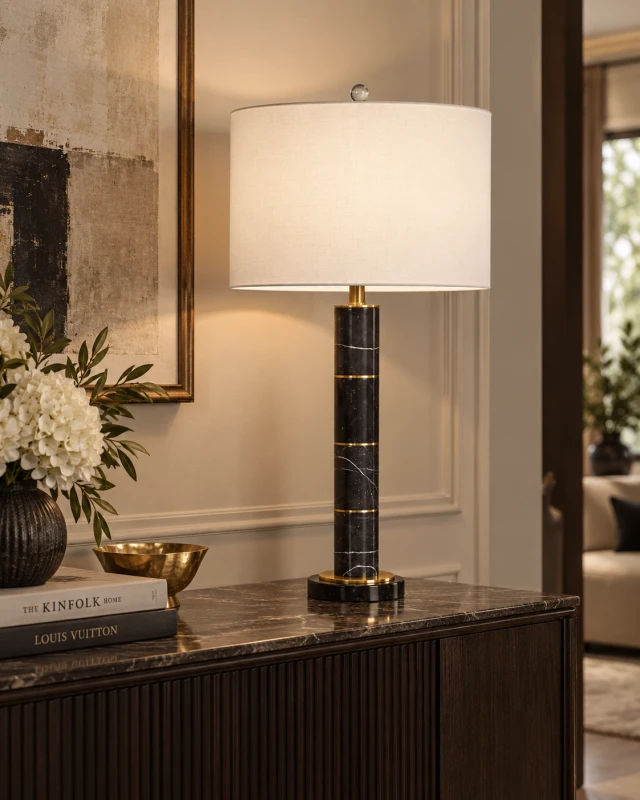 Black marble table lamp with gold details and white shade
