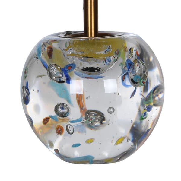 Close-up of clear glass base with colourful inclusions on Portobello table lamp