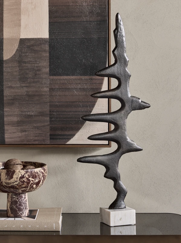 Pulse abstract sculpture styled on a console table in a refined interior