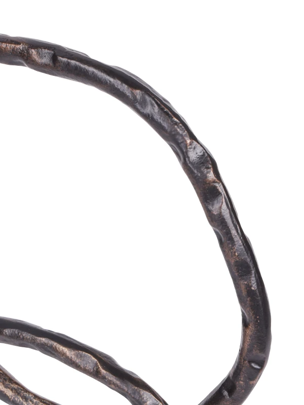 Close-up of distressed textured aluminium finish on Evren sculpture