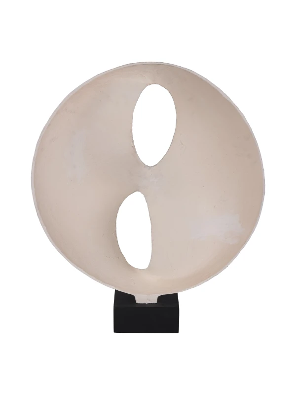 Solenne cream sculpture with organic cut-outs and black base