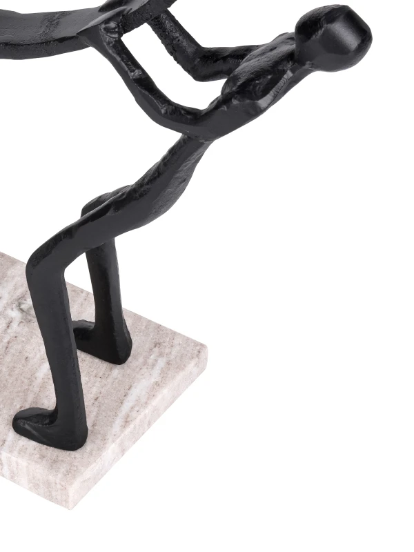 Close-up of two abstract figures on Balance sculpture