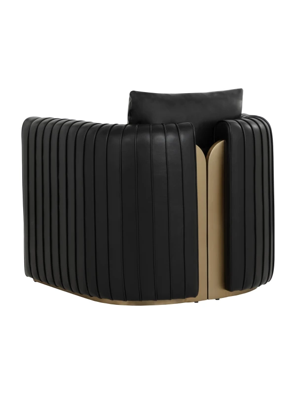 Rear view of black armchair with channelled upholstery