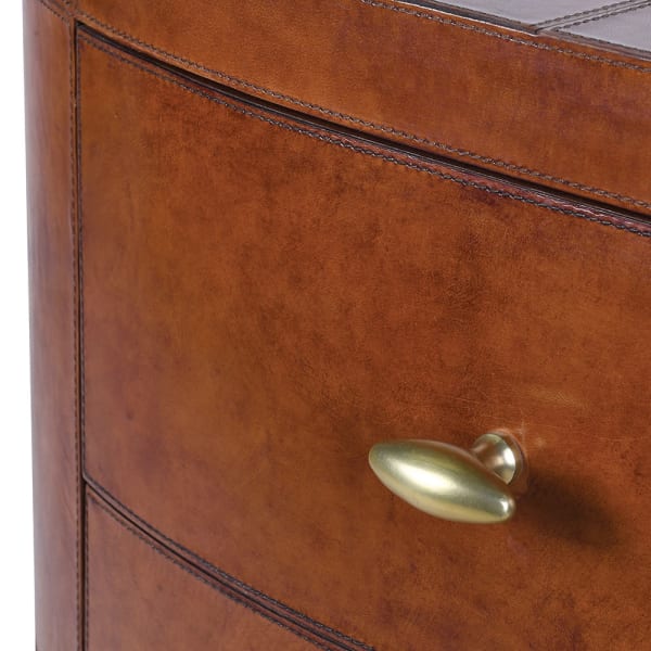 Tall brown leather chest with five drawers
