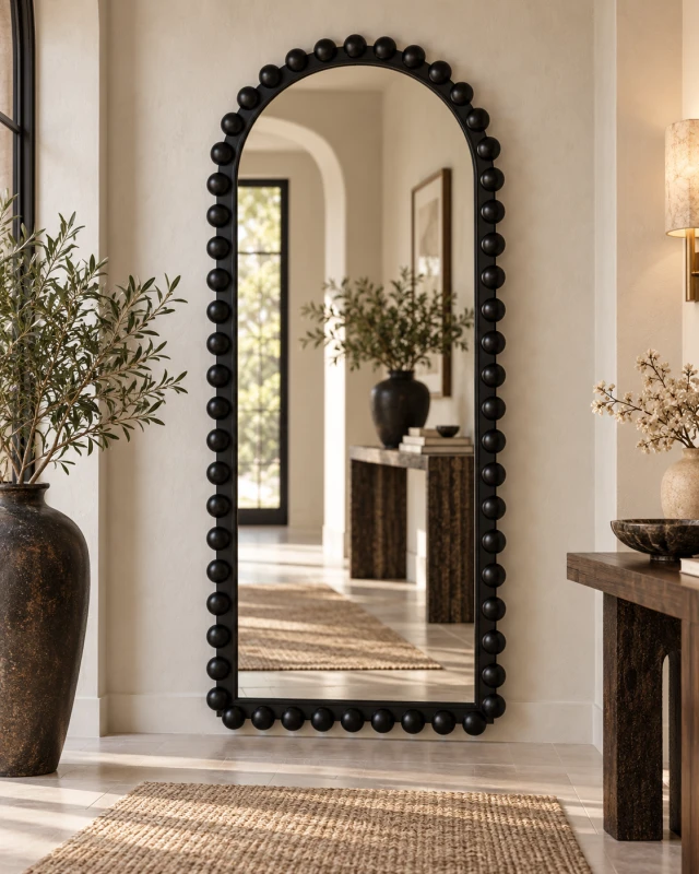 Cadogan Black statement mirror with rounded frame detailing
