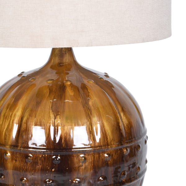 Amber table lamp with natural linen shade