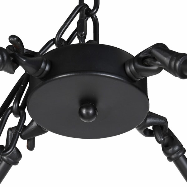 Tiered black metal chandelier with architectural design