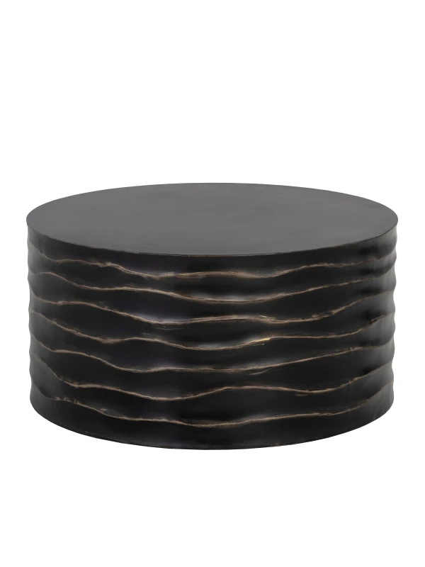 Black sculptural coffee table with wave-like ridges
