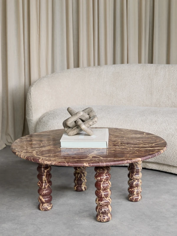 Round Jasper red marble coffee table with sculptural bobbin legs