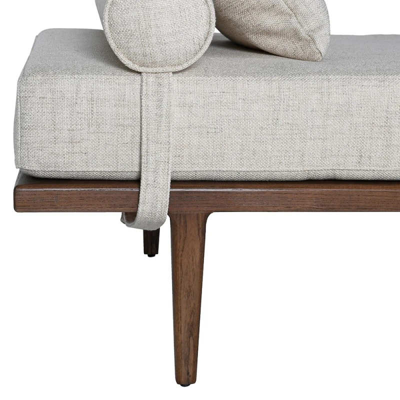 Oak framed day bed with neutral linen upholstery