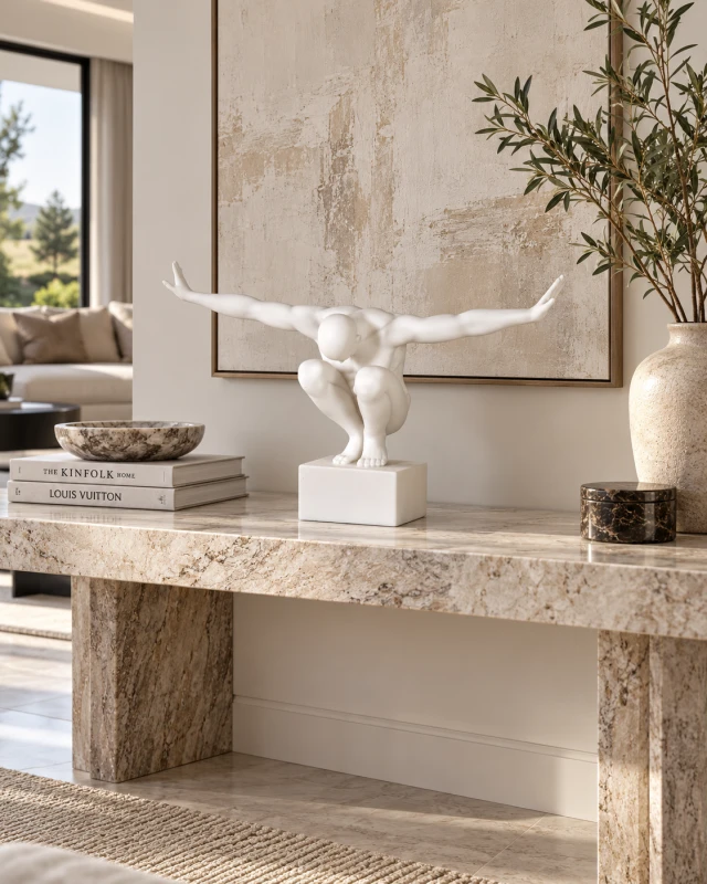 White male figure sculpture with outstretched arms