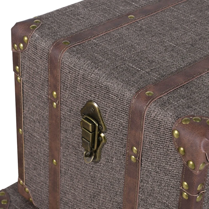 Textured linen, brown straps and antique brass-effect clasp on Aldwych storage trunk