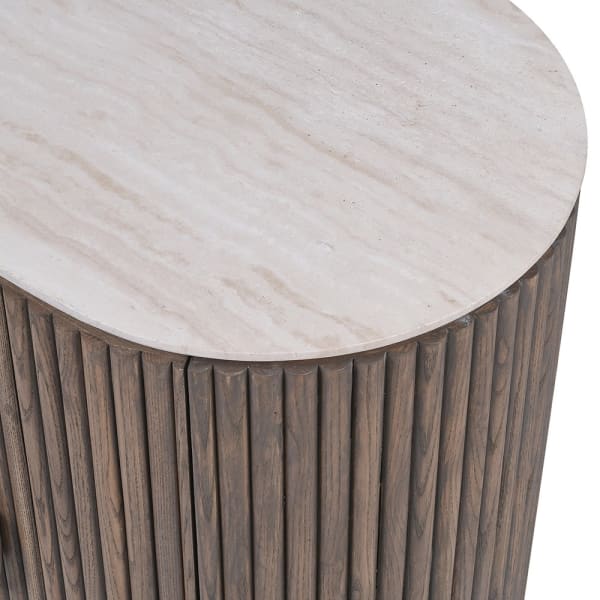 Pale marble top with subtle natural veining above fluted ash veneer cabinet