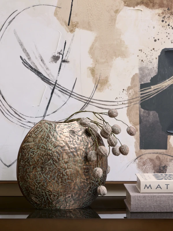 Chiswick Large sculptural bronze vase displayed on a dark console table