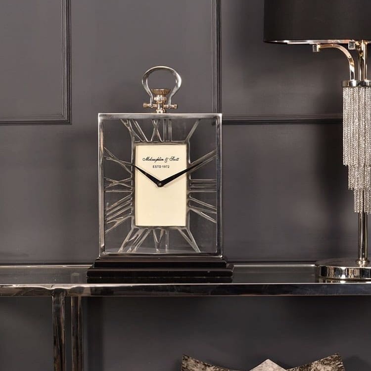 Minor stainless steel tabletop clock