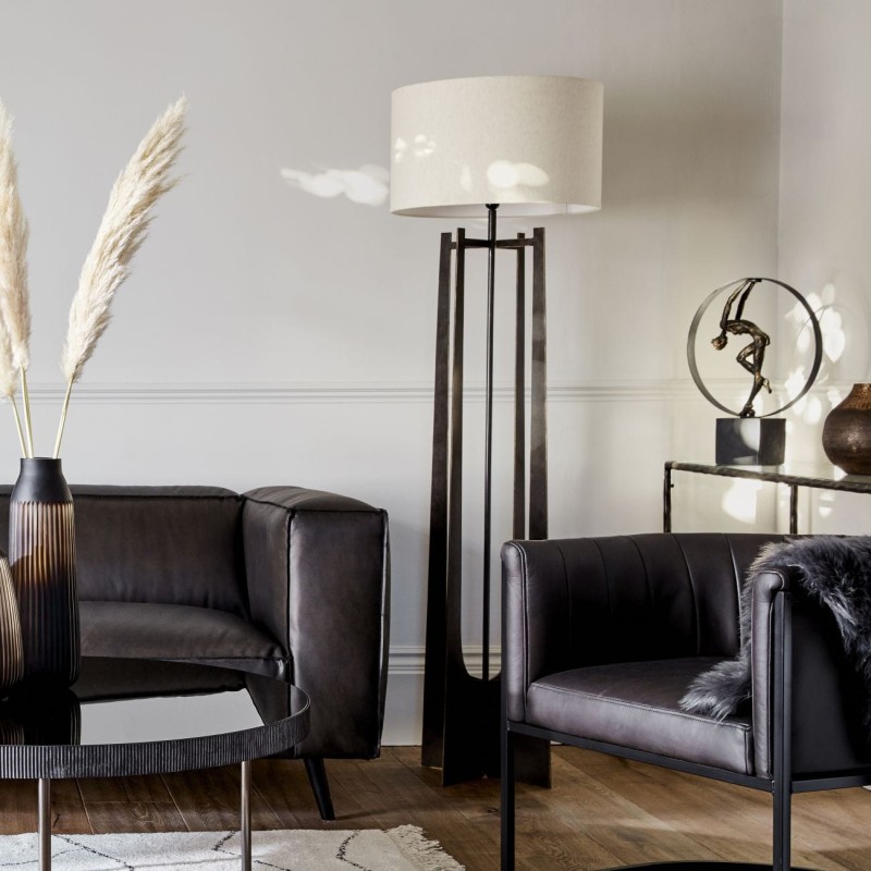 Black standing lamp for a bedroom