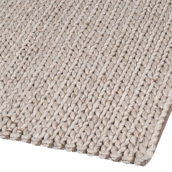Natural beige wool rug for a contemporary living room