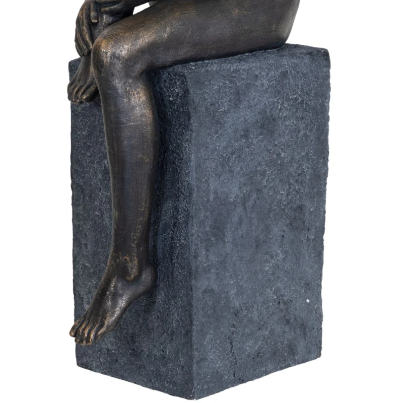 Contemplative seated woman sculpture in polyresin