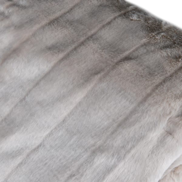 Luxury off-white faux fur throw for elegant bedroom interior